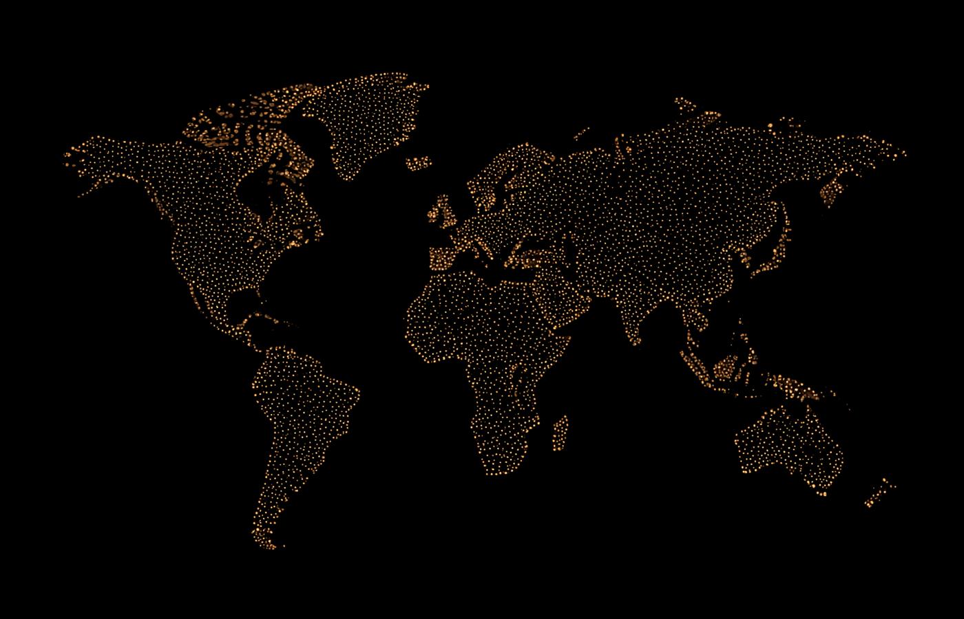 Abstract world map rendered in amber points of light